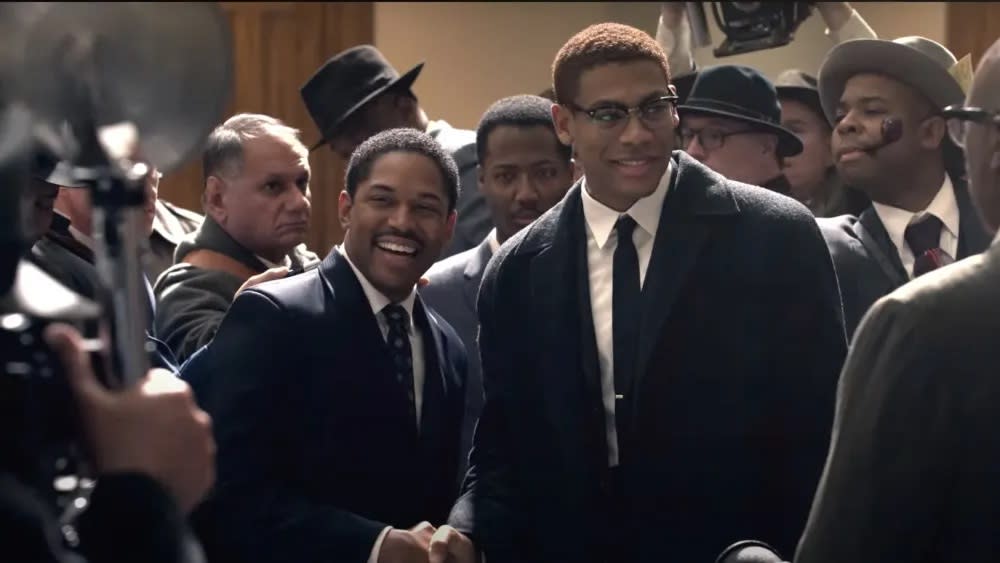  Kelvin Harrison Jr and Aaron Pierre as Dr. Martin Luther King Jr. and Malcolm X shaking hands in Genius: MLK/X. 