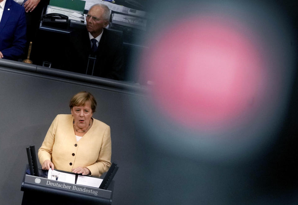 German Chancellor Angela Merkel speaks during a debate about the situation in Germany ahead of the upcoming national election in Berlin, Germany, Tuesday, Sept. 7, 2021. National elections are scheduled in Germany for Sept. 26, 2021. (AP Photo/Markus Schreiber)