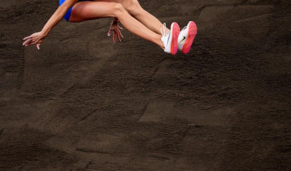 Ukraine's Olha Saladukha competes in women's triple jump qualifying.