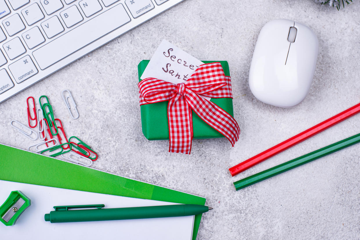 A whopping 2.5 million office Secret Santa presents end up in the bin. (Getty Images)