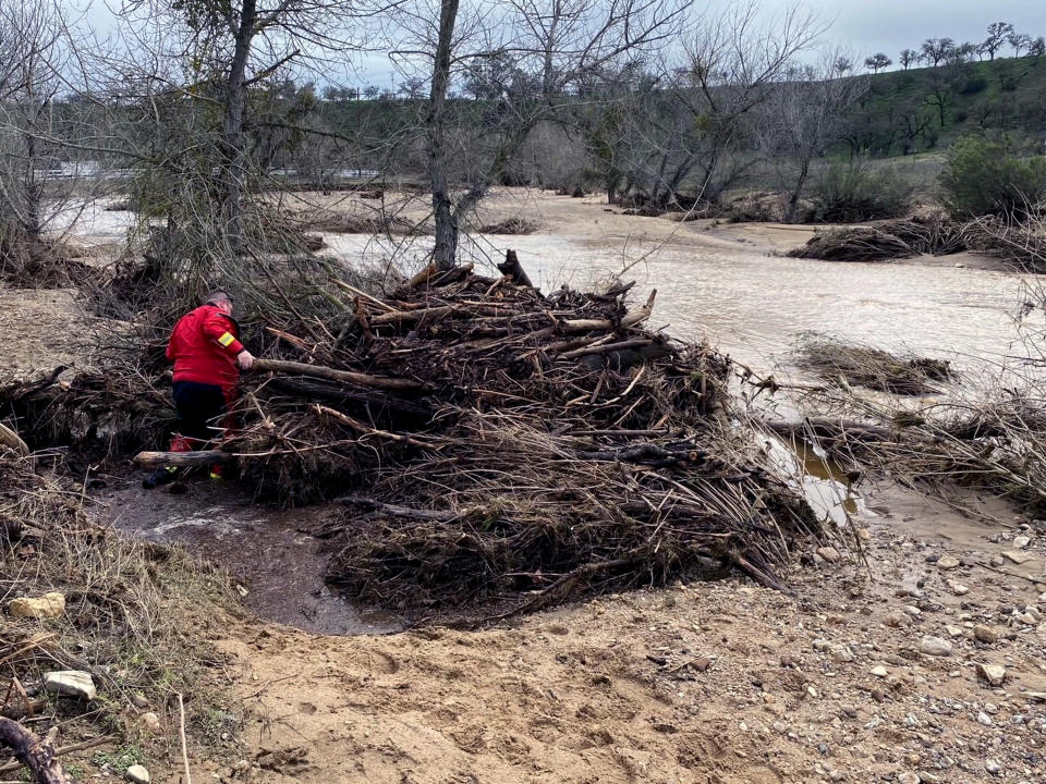 In this photo provided by San Luis Obispo County Sheriff's Office, rescuers resume their search on Wednesday, Jan. 11, 2023, for 5-year-old Kyle Doan, who was swept away Monday, Jan. 9, by floodwaters near San Miguel, Calif. (San Luis Obispo County Sheriff's Office via AP)