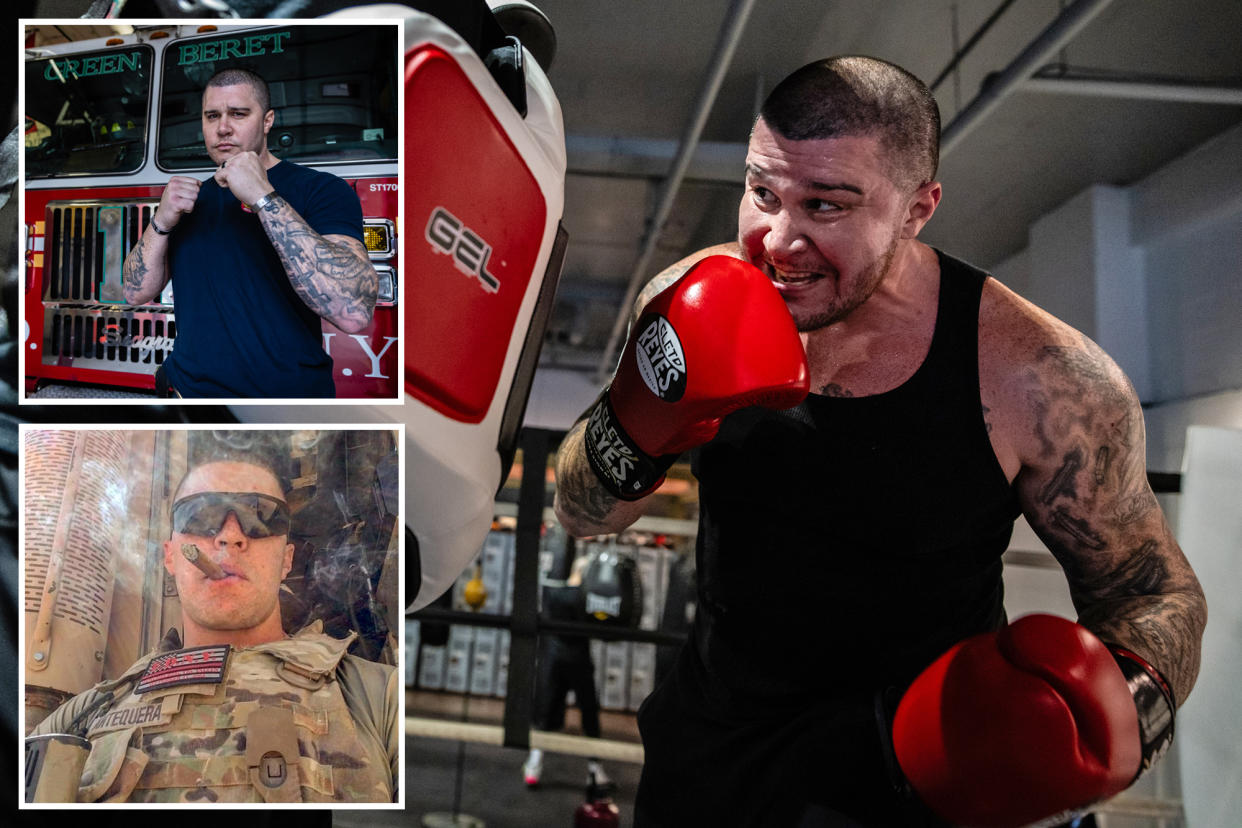 FDNY firefighter Victor Woods punches a pad held by his trainer