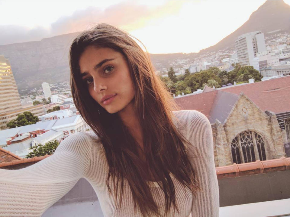 <p>Model Taylor Hill pauses for a stunning sunset selfie. “Lil pit stop in beautiful Cape Town,” she says.</p>
