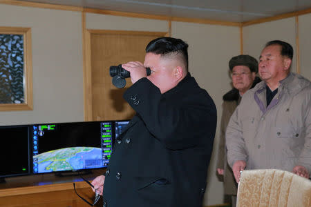 North Korean leader Kim Jong Un guides the test-fire of Pukguksong-2 on the spot, in this undated photo released by North Korea's Korean Central News Agency (KCNA) in Pyongyang February 13, 2017. KCNA/Handout via Reuters