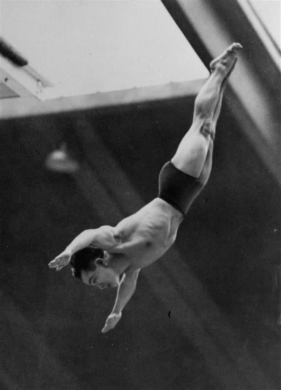 Dr. Sammy Lee, U.S. Army Medical Lieutenant from Pasadena, Calif., dives from the tower of the Empire Pool in Wembley, England, August 5, 1948 in the Olympic Tower Diving Championships.