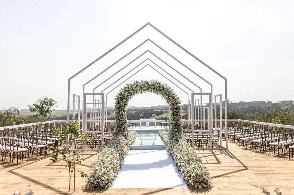 <p>Last year's weddings were all about color, iridescence, lucite and more–but we’re anticipating a stronger shift to minimal structures and open environments come Fall. Be it al fresco, in a field, or in a gallery, sleek structures are a new way to think about tents, ceremony markers, and the ways to frame your festivities. White and all 50 shades of grey drive this trend, but pops of deep, rich monochromatic color can add personality to these industrial structures.</p>