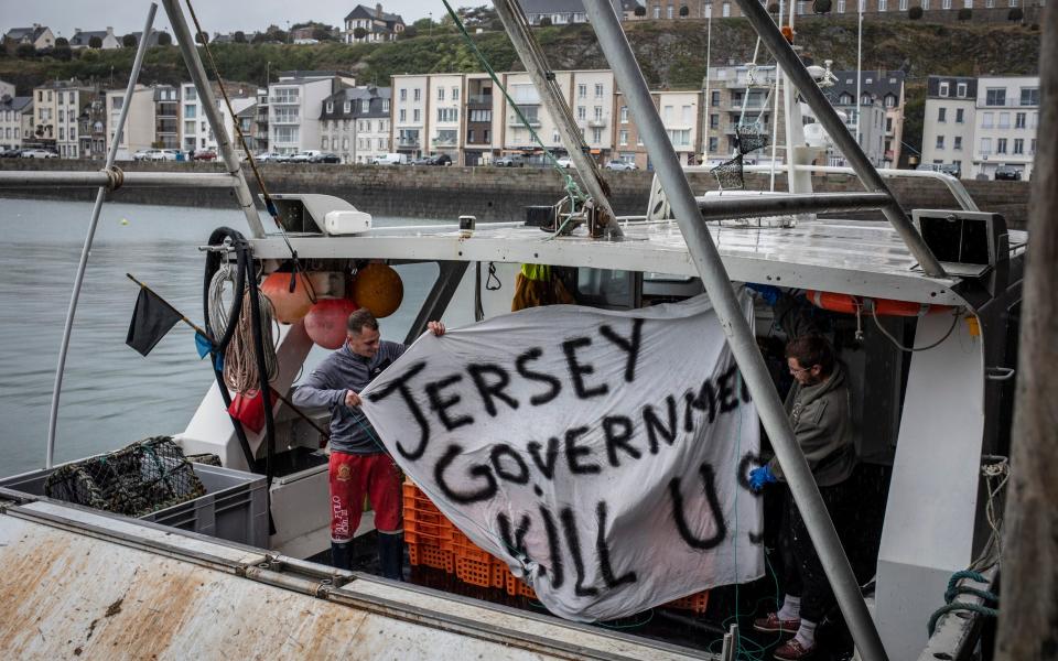 French fishermen who have just returned from sea protesting with a fleet of fishing boats in the territorial waters of Jersey - Siegfried Modola/Getty Images Europe 