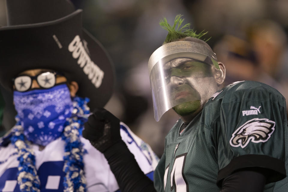 PHILADELPHIA, PA - NOVEMBER 01: A Dallas Cowboys and Philadelphia Eagles fan look on during the game at Lincoln Financial Field on November 1, 2020 in Philadelphia, Pennsylvania. (Photo by Mitchell Leff/Getty Images)