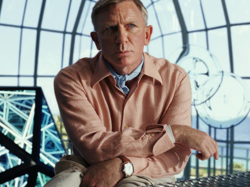 Daniel Craig in a pink shirt