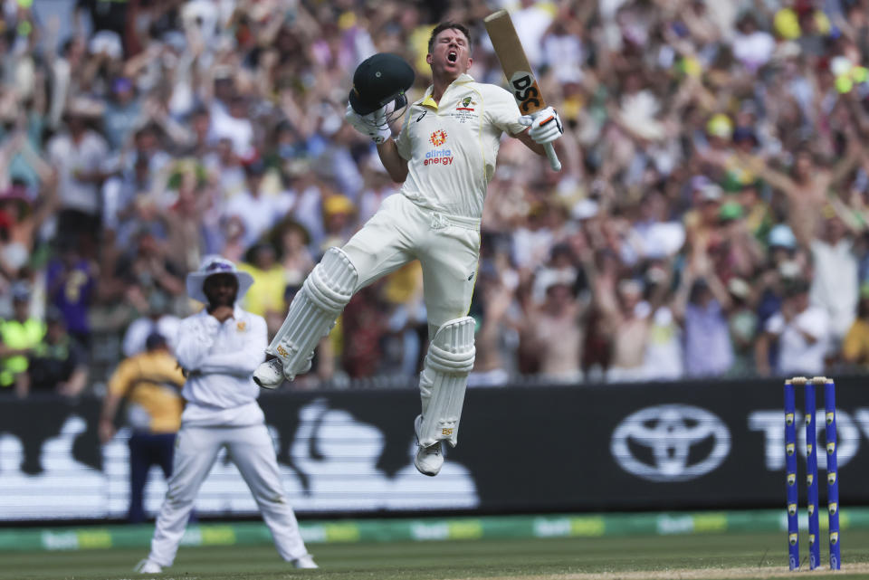 Australia's David Warner celebrates after scoring 200 runs during the second cricket test between South Africa and Australia at the Melbourne Cricket Ground, Australia, Tuesday, Dec. 27, 2022. (AP Photo/Asanka Brendon Ratnayake)