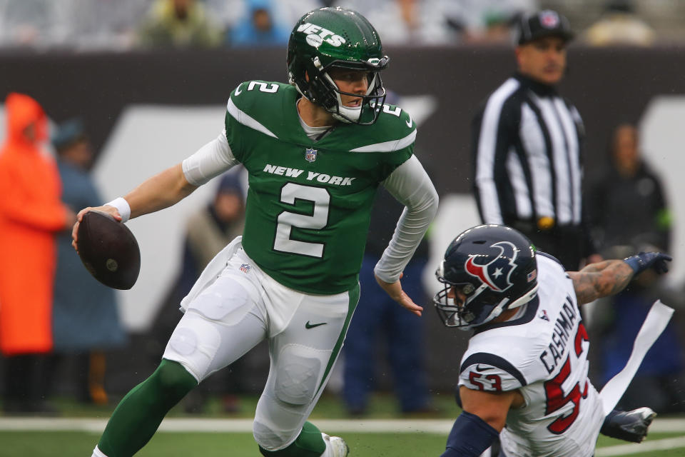 New York Jets quarterback Zach Wilson returned to the starting lineup against the Houston Texans, and turned in a massive response to the news circulating around him. (AP Photo/John Munson)