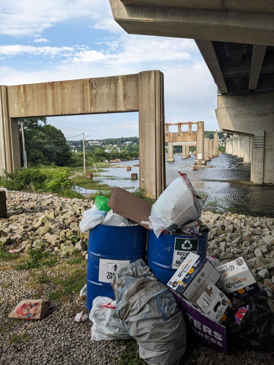 Overflowing trash cans procured by a private citizen from Fall River who uses Narragansett Boulevard Beach beach after Nicole Gotovich chastised him and asked him to clean up the beach.