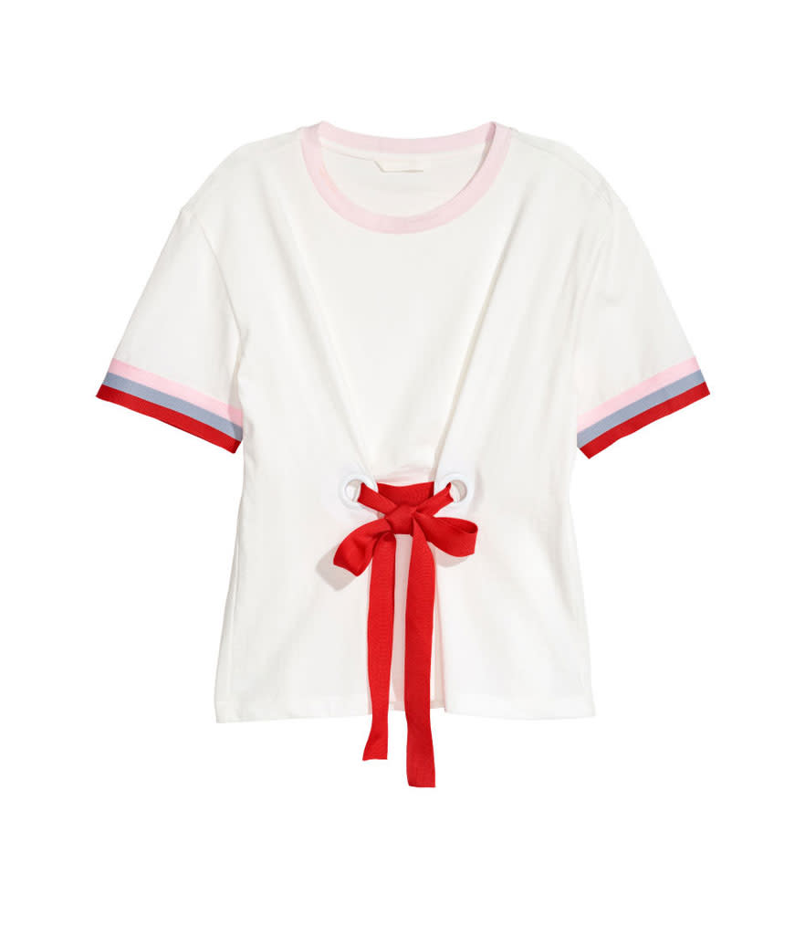 <p>Top White Tee, $17.99, <a rel="nofollow noopener" href="http://www.hm.com/us/product/94967?article=94967-A" target="_blank" data-ylk="slk:hm.com;elm:context_link;itc:0;sec:content-canvas" class="link ">hm.com</a> </p>