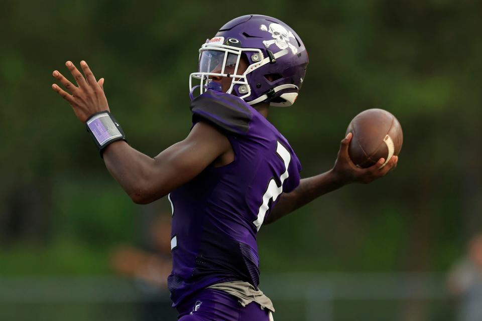Fletcher quarterback Marcelis Tate throws a pass during the kickoff classic. Tate passed for 331 yards and four touchdowns against Englewood.