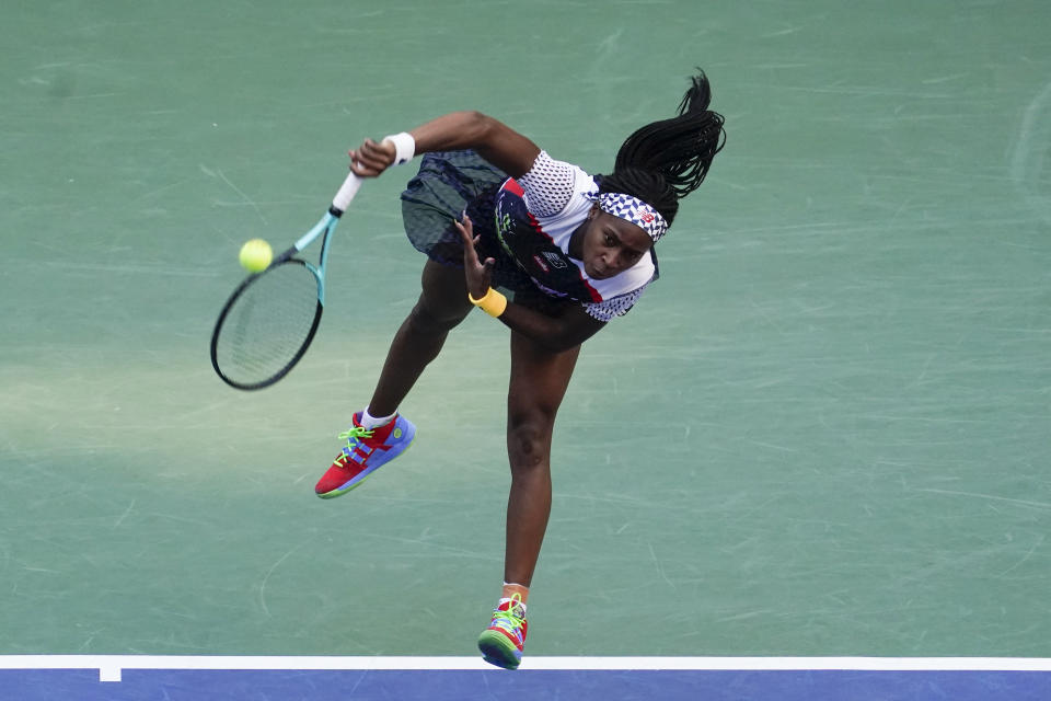 Coco Gauff, of the United States, serves to Madison Keys, of the United States, during the third round of the U.S. Open tennis championships, Friday, Sept. 2, 2022, in New York. (AP Photo/Seth Wenig)
