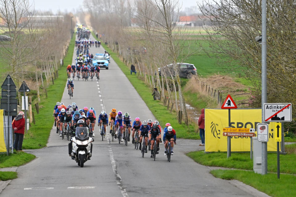 DE PANNE BELGIUM  MARCH 23 The Peloton competes in echelons formation due the crosswind during the 6th Exterioo Womens Classic BruggeDe Panne 2023 a 1631km one day race from Brugge to De Panne  UCIWWT  on March 23 2023 in De Panne Belgium Photo by Luc ClaessenGetty Images