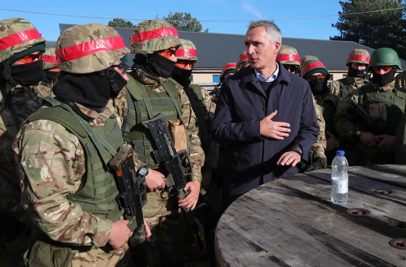 NATO Secretary General Jens Stoltenberg observes Operation Interflex during a visit to Lydd Camp in Kent