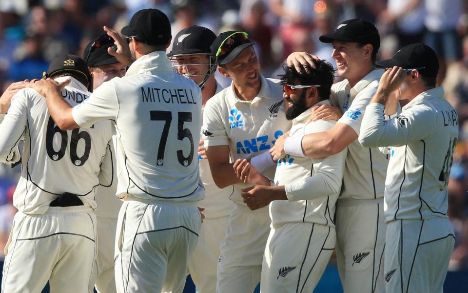 New Zealand's Ajaz Patel (3R) celebrates after New Zealand's Tom Blundell (L) caught England's Joe Root off his bowling on the third day of the second Test cricket match between England and New Zealand at Edgbaston Cricket  - AFP