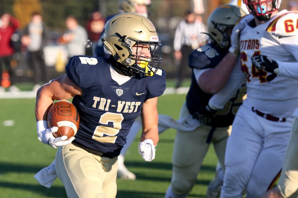 Tri-West Hendricks Noah Lien (2) on the run as Tri-West takes on Gibson Southern High School in the IHSAA 3A Regional Championship, Nov 11, 2023; Lizton, IN, USA; at Tri-West High School.