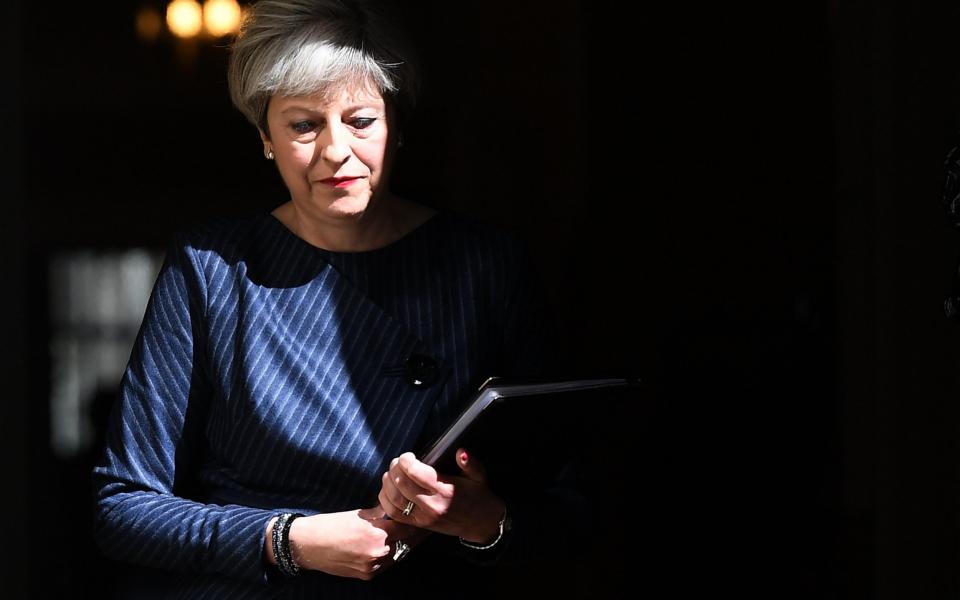 Theresa May ahead of delivering a statement outside 10 Downing Street in London, Britain, 18 April 2017 - ANDY RAIN /EPA