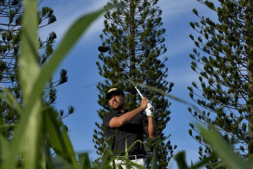 Xander Schauffele hits from the third tee during the first round of The Sentry golf event, Thursday, Jan. 4, 2024, at Kapalua Plantation Course in Kapalua, Hawaii. (AP Photo/Matt York)