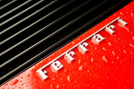 FILE PHOTO: The Ferrari Insignia is seen at the back of a Ferrari Testarossa during a media tour of the Fullerton Concours d'Elegance in Singapore