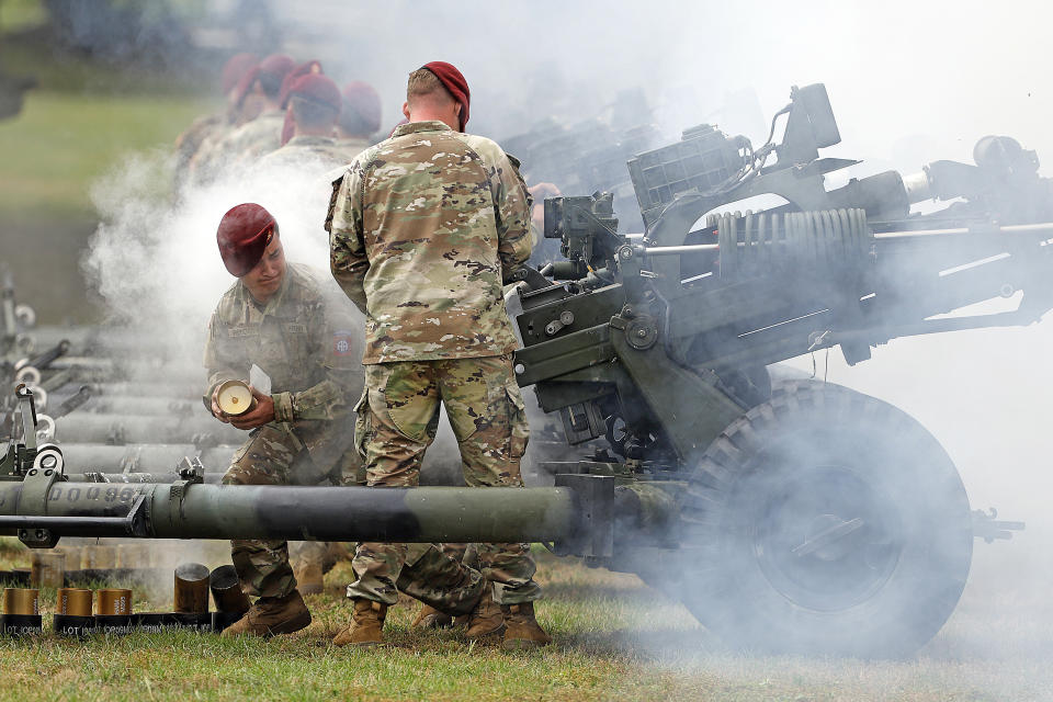 Crews fire their guns during a 15-gun salute as a part of the ceremony to rename Fort Bragg, Friday, June 2, 2023 in Fort Liberty, N.C. The U.S. Army changed Fort Bragg to Fort Liberty as part of a broader initiative to remove Confederate names from bases. (AP Photo/Karl B DeBlaker)