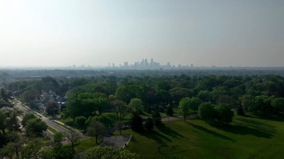 Wildfire smoke hangs over the Minneapolis skyline on May 13, 2024 (AP)