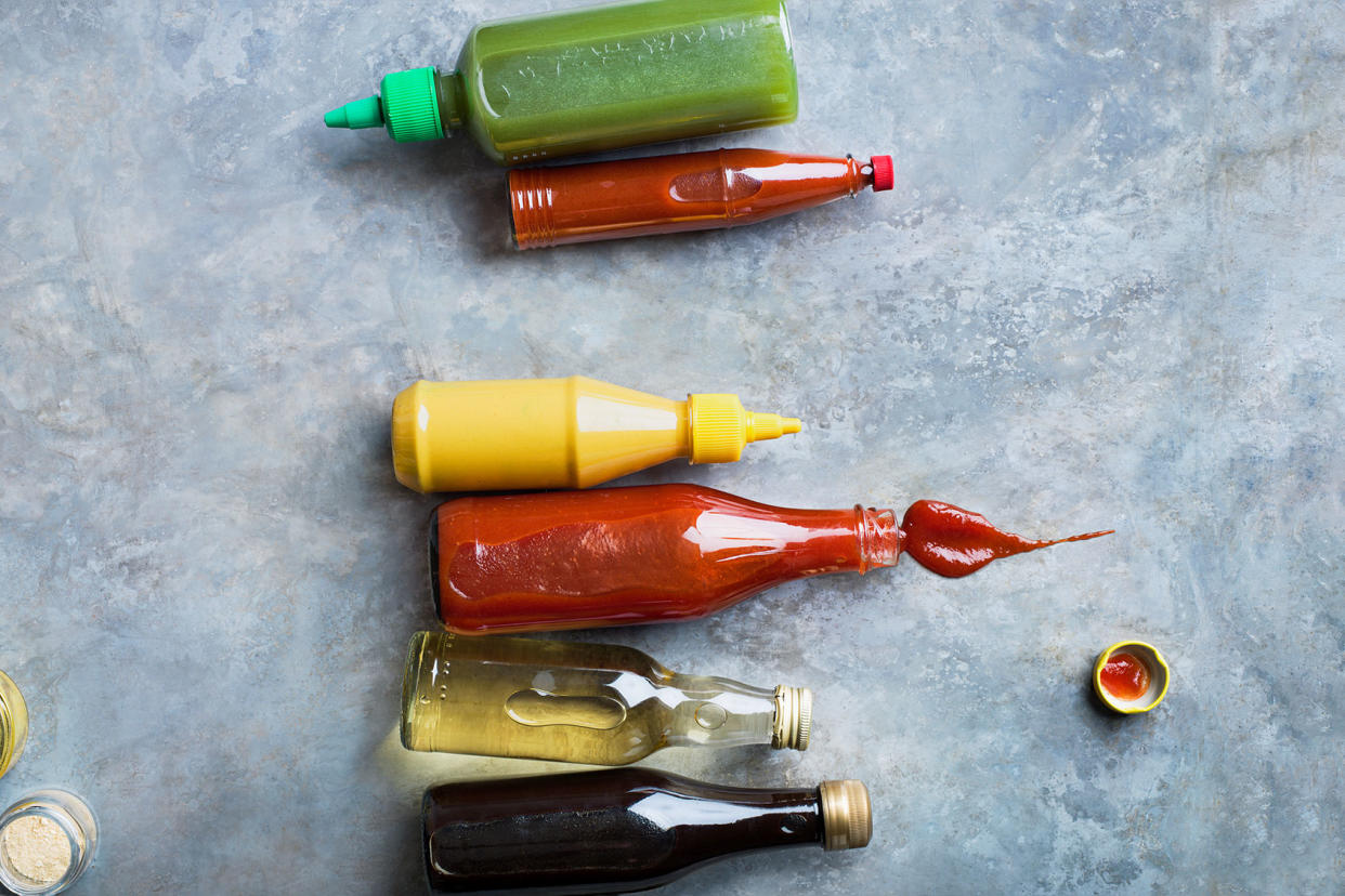 Condiments in bottles Getty Images/Johner Images