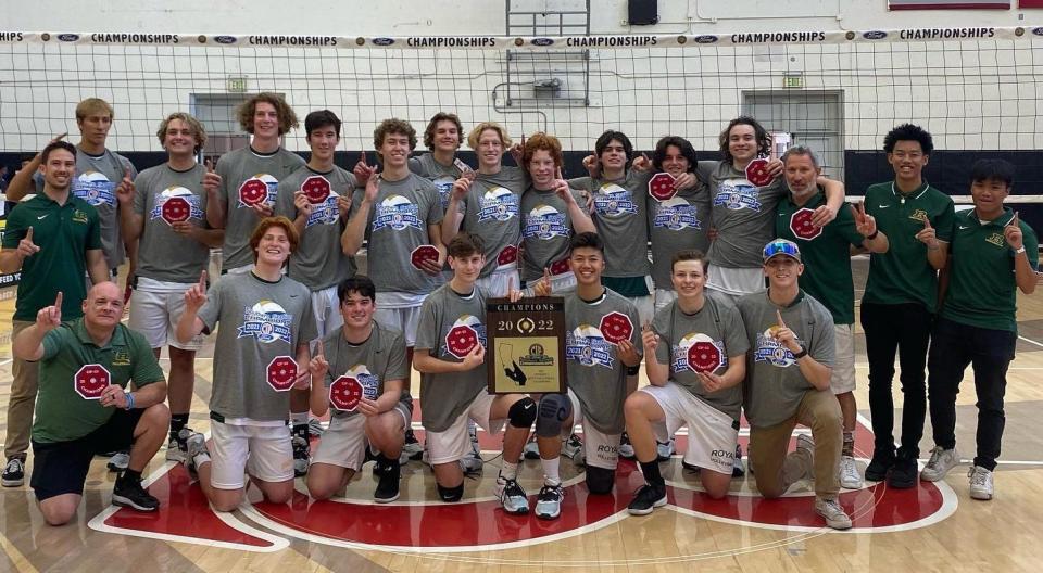 The Royal High boys volleyball team poses with its championship plaque and patches after winning the CIF-SS Division 3 title on Saturday.