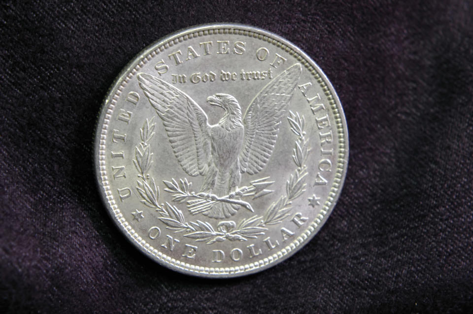 A silver dollar from 1887.&nbsp;&ldquo;In God we trust&rdquo; started appearing on U.S. coins in 1864, partly&nbsp;in reaction to the Confederacy&rsquo;s declaring itself a Christian nation. (Photo: MyLoupe via Getty Images)