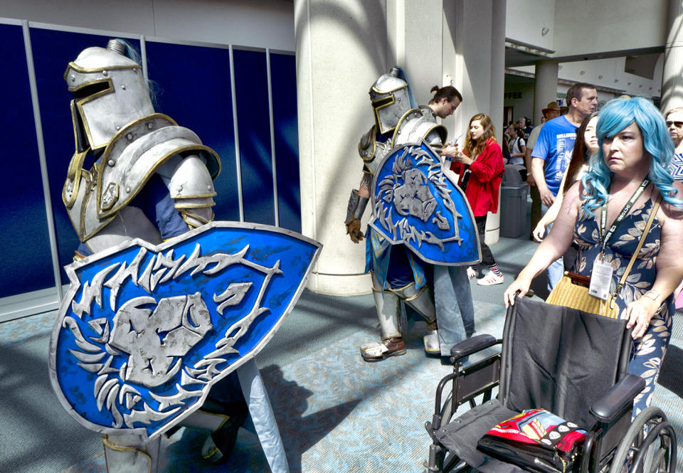 <p>Michael Mijerark and Ryan Trent dress as knights from <em>Warcraft</em> at Comic-Con International on July 19, 2018, in San Diego. (Photo: Richard Vogel/AP) </p>