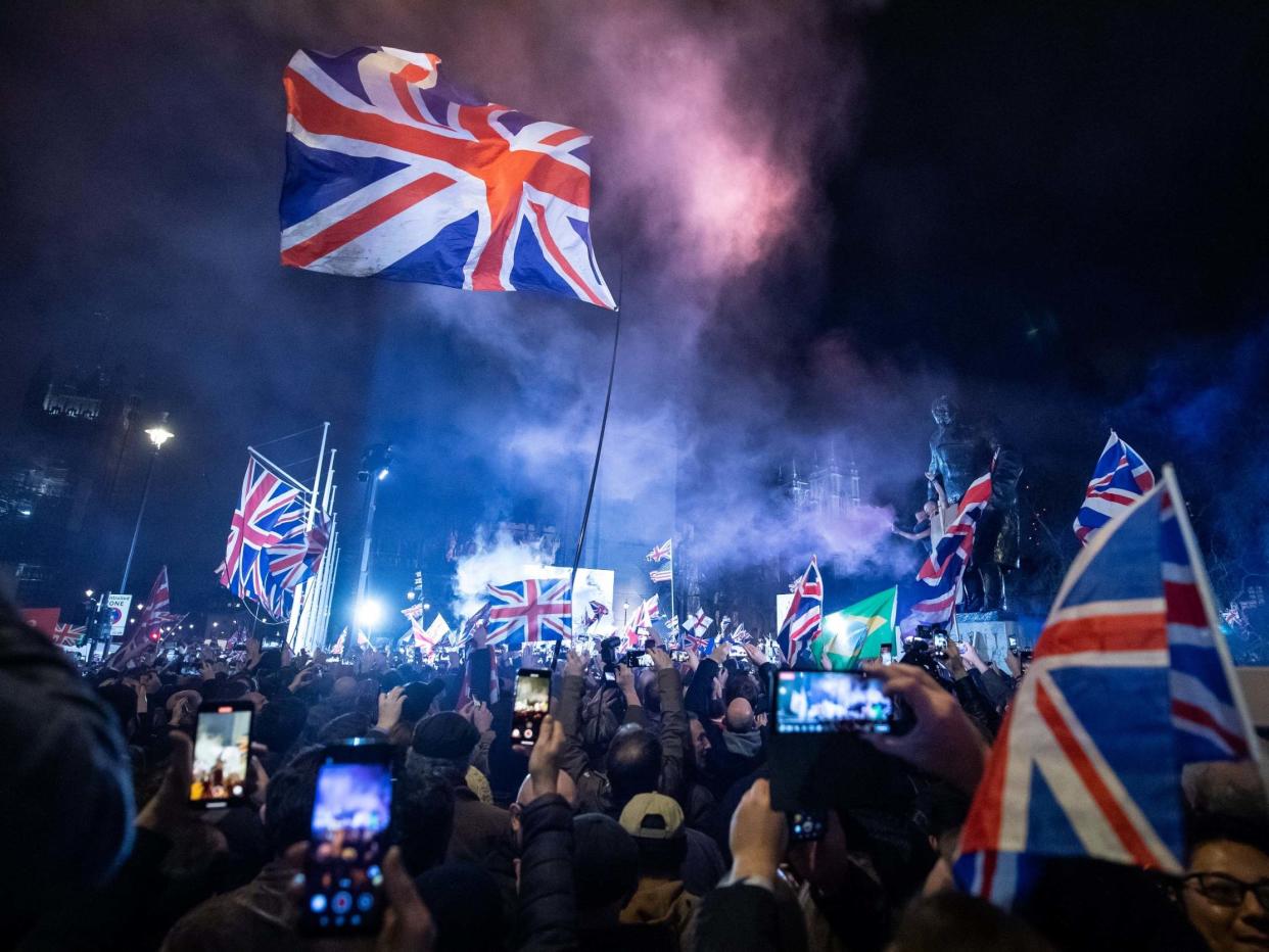 Brexiteers celebrate at Parliament Square as the UK exits the EU: Getty Images