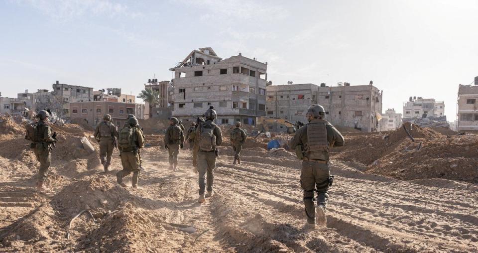 Israeli soldiers operate in the Gaza Strip, amid the ongoing conflict between Israel and the Palestinian Islamist group Hamas (via REUTERS)