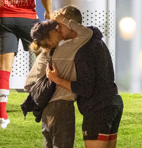 <p>Diggzy/Jesal/SplashNews</p> Ant Anstead and Renee Zellweger share a kiss during one of Anstead's soccer games.