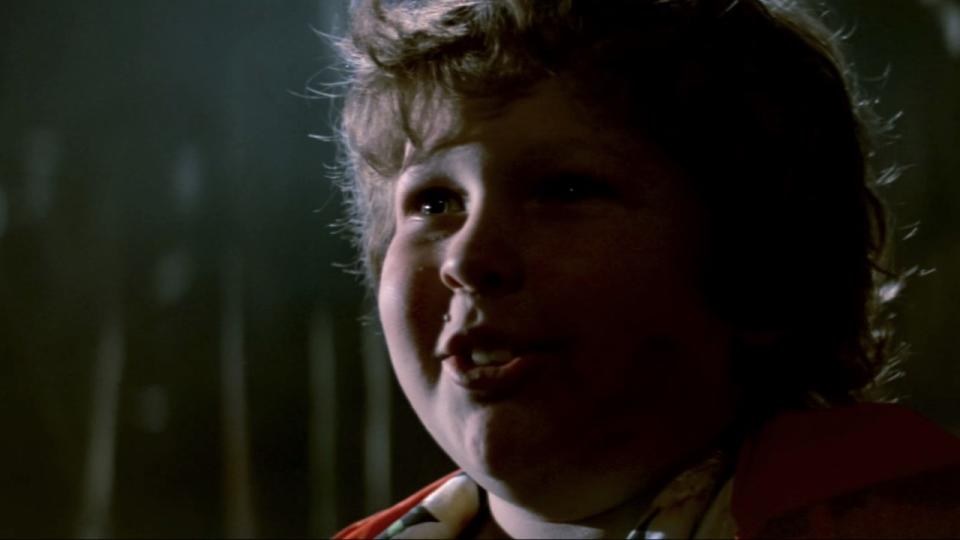 Chunk smiling at Sloth in The Goonies