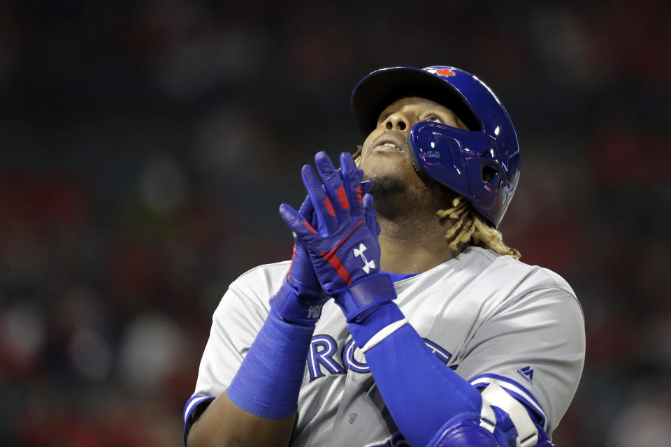 Toronto Blue Jays' Vladimir Guerrero Jr. gestures as he leaves the baseball game against the Los Angeles Angels during the ninth inning in Anaheim, Calif., Tuesday, April 30, 2019. (AP Photo/Chris Carlson)