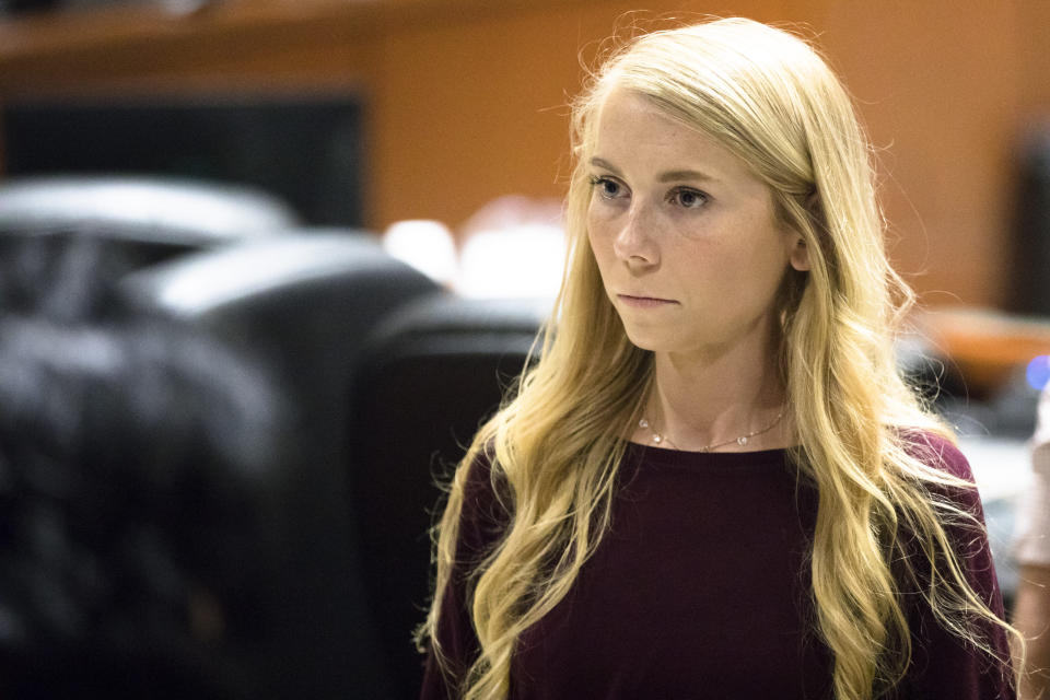 Brooke "Skylar" Richardson steps out of the courtroom during a recess of proceedings, at Warren County Common Pleas Court in, Ohio. Richardson is on trial in the death of her newborn daughter found buried in her family's Ohio backyard.