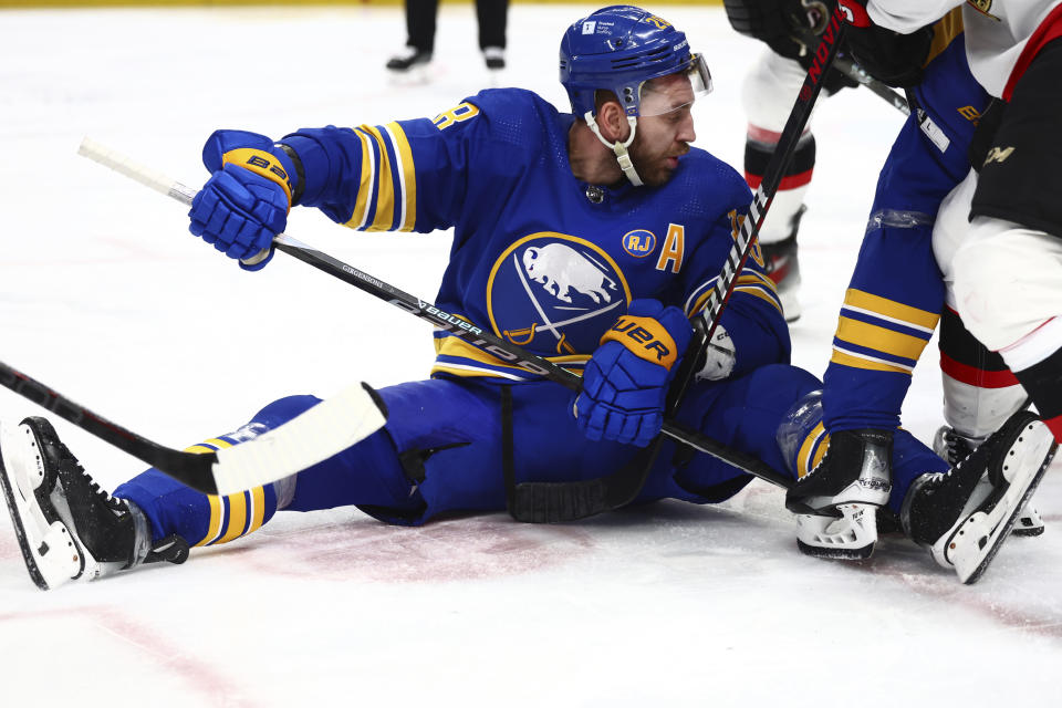 Buffalo Sabres left wing Zemgus Girgensons (28) looks for the puck after being checked to the ice during the second period of an NHL hockey game against the Ottawa Senators Wednesday, March 27, 2024, in Buffalo, N.Y. (AP Photo/Jeffrey T. Barnes)