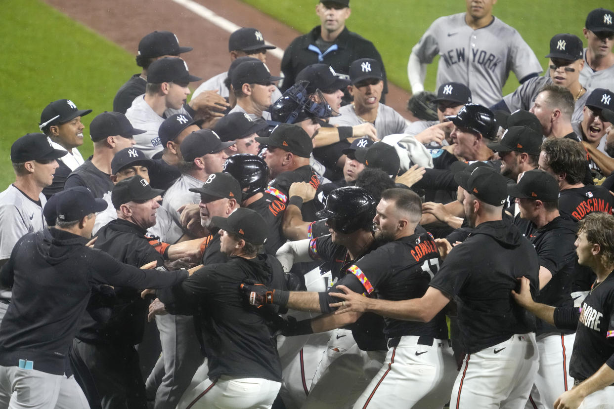 BALTIMORE, MD - JULY 12:  Benches clear after Heston Kjerstad #13 of the Baltimore Orioles is hit by pitch in the ninth inn during a baseball game against the New York Yankees at the Oriole Park at Camden Yards on July 12, 2024 in Baltimore, Maryland.  (Photo by Mitchell Layton/Getty Images)