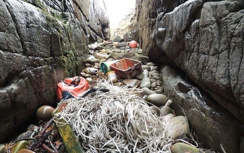 Rubbish washed up on Rum national nature reserve - Credit: SNH