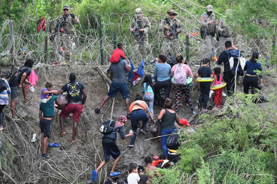 Migrant people try to get to the US through the Rio Grande as seen from Matamoros, state of Tamaulipas, Mexico on May 11, 2023.