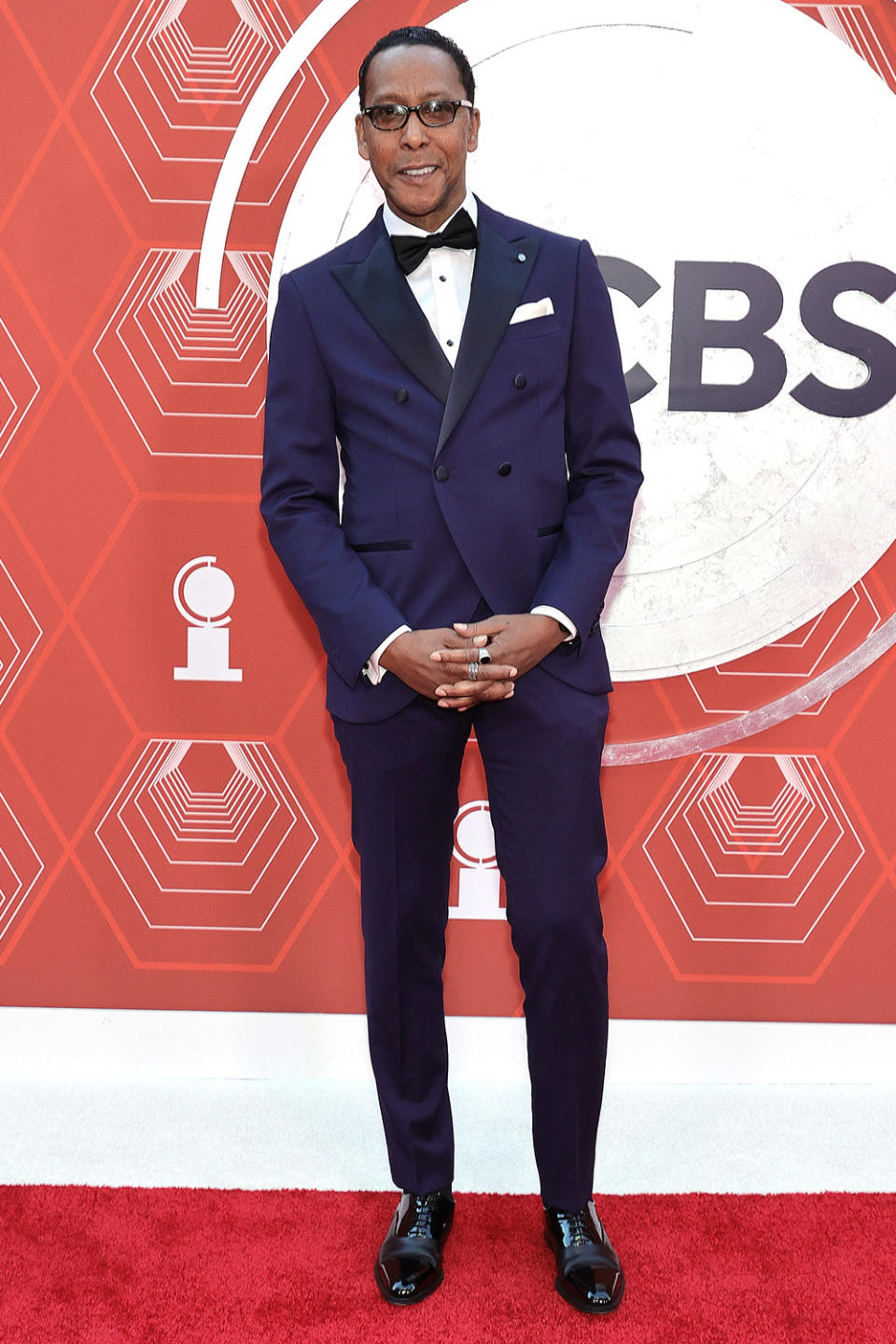 <p>The <em>This Is Us </em>actor wears a navy blue tux by Luigi Bianchi Mantova Flirt to present the first award of the evening. </p>