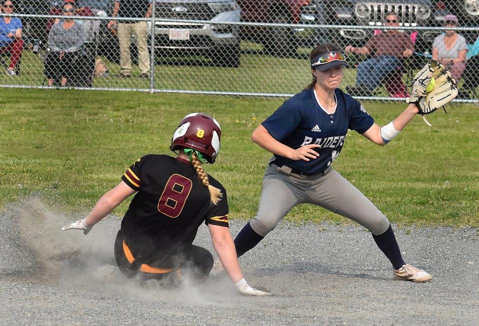 Case's Brooke Orton slides into second base with a double as Somerset Berkley shortstop Julia Costa gets the throw late.