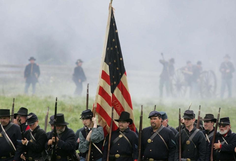 Battlefield reenactments of the Civil War draw many spectators to Hale Farm & Village.