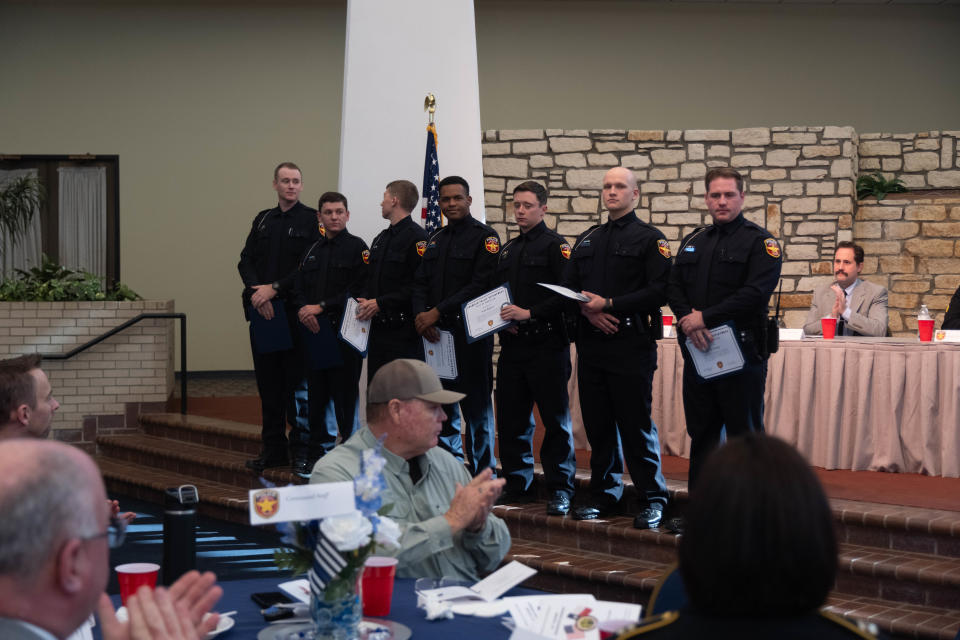 Members of the 101st Amarillo Police Academy take the stage for the first time as Amarillo police officers Thursday at the Amarillo Civic Center.