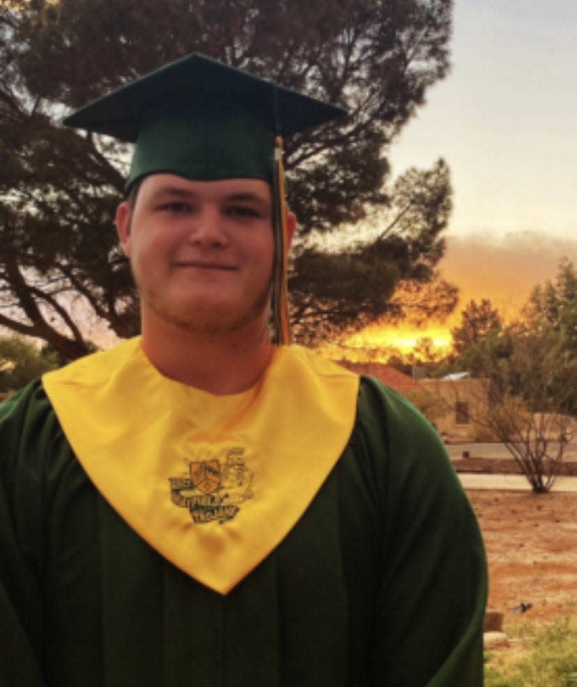 Canaan Bower pictured in his graduation cap and gown. Canaan graduated from Mayfield High School in May 2021. Canaan's heroism was widely recognized after he intervened in a kidnapping at a gas station in 2020. Canaan passed on March 9, 2022 in a motorcycle accident at the age of 18.