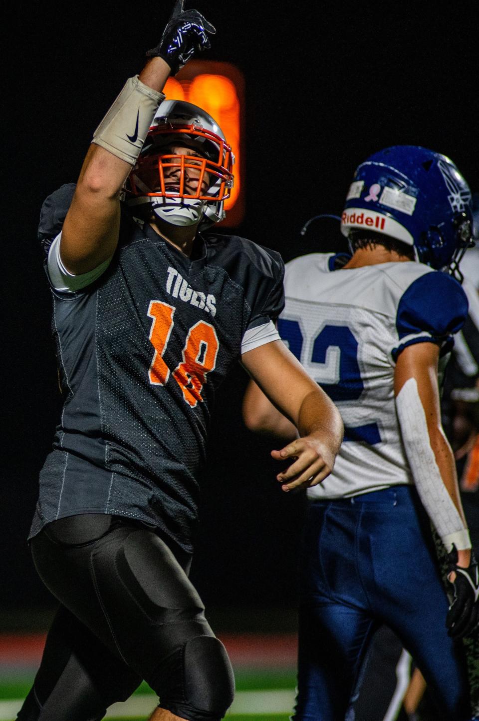 Pawling's Brett Clowry points to the sky after scoring a touchdown during an Oct. 6, 2023 football game against Pine Plains/Rhinebeck. The quarterback paid tribute to George Guerro, a close friend and former schoolmate who died a week earlier.