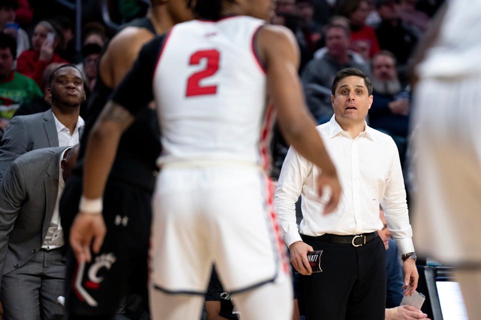 Cincinnati Bearcats Wes Miller coaches in the second half of the NCAA men’s basketball game at Fifth Third Arena in Cincinnati on Wednesday, Dec. 21, 2022. Cincinnati Bearcats defeated Detroit Mercy Titans 72-54. 