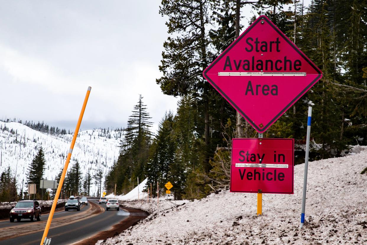 An avalanche warning sign warns drivers along Highway 126 near Santiam Pass Thursday, March 30, 2023. 